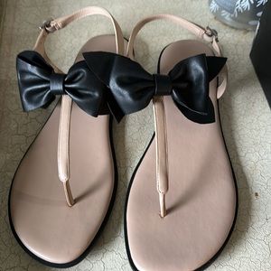 Never worn Karl Lagerfeld sandals with black bow.